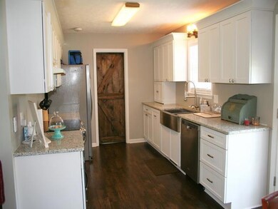 Brand new kitchen, sliding barn wood door to utility room