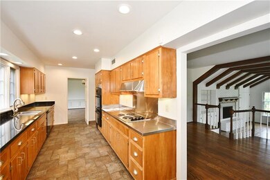 From kitchen, looking toward informal eating area 