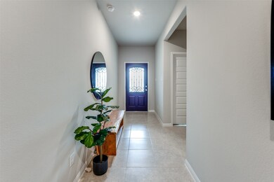 Open and airy entry is so inviting and bright.