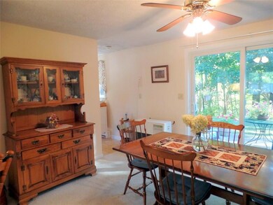 This dining room area accommodates a...