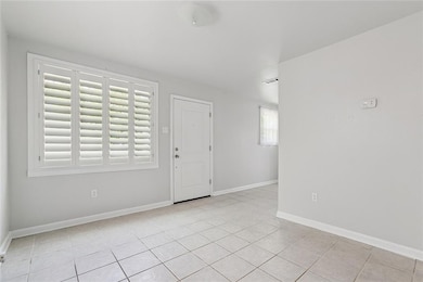 Front Door facing, living room area