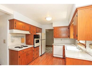 The Kitchen is accessible from the Dining Room.