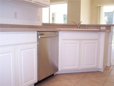 Kitchen with stainless steel dishwasher and dual k