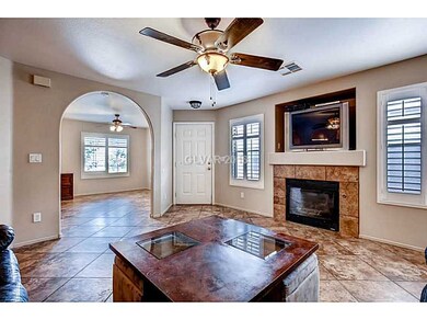 Living Room. View of the entry door and den area t