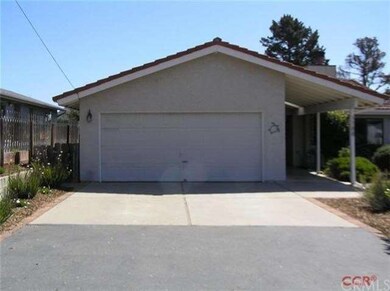 2 Car garage with concrete driveway and extra park