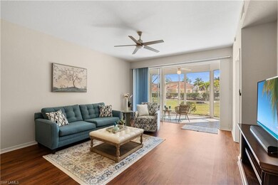 Living area featuring wood finished floors & ceili