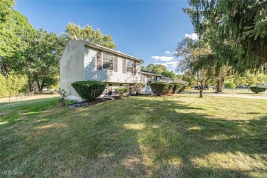 View of home's exterior featuring a yard