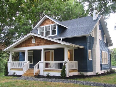 Exterior front showing cedar shingle accents