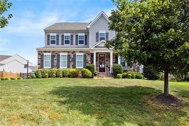 Front of house with  porch, front lawn, and sidelo