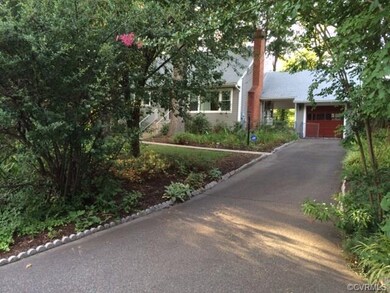 Paved Drive & Aggregate Sidewalk