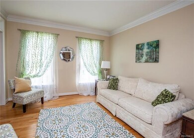 Living Room/Flex Room with hardwood floors and lot