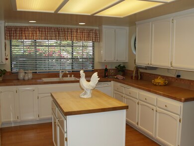 Updated Kitchen with Butcher Block Islan