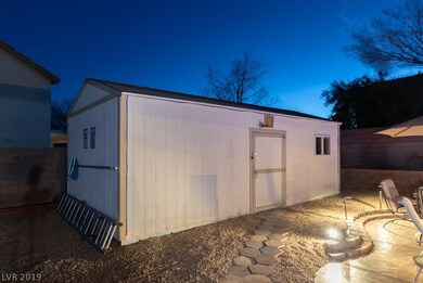 Outdoor pool house/tuff shed has electrical and AC