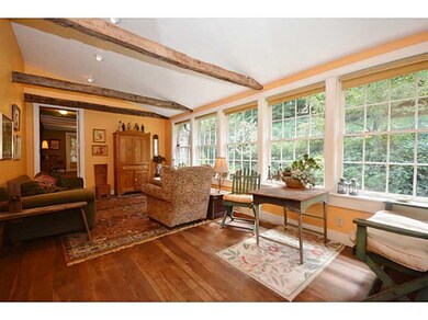 Family Room. Beamed Ceilings, Cherry Flooring and 
