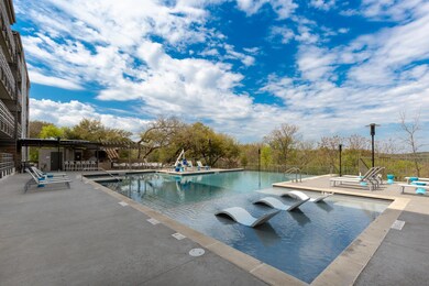 Community pool featuring a patio