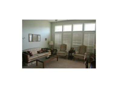 Great room with plantation shutters