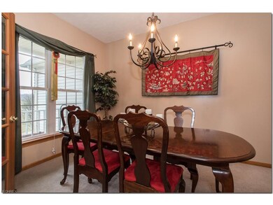 Formal dining room that enters from both the kitch