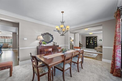 Spacious dining room is elegant and offers neutral