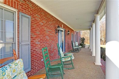 Enjoy the view from your front porch.  Plenty of room for family and friends to join you!