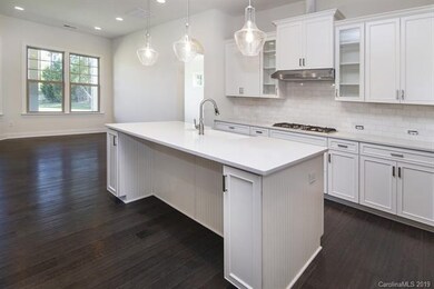 Open Kitchen with a great center Island!   -repres