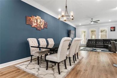 Dining room with light hardwood / wood-style floor