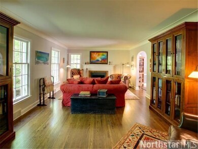 Living Room w/ wood burning fireplace, plaster wal