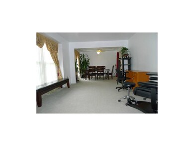 Conbo Living and Dining Rooms with bay window.
