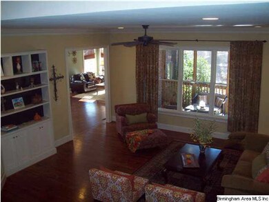 Spacious Great Room offers beautiful wooded view