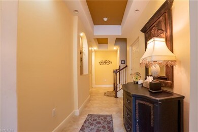 Foyer from front door access to 2-car garage, elev