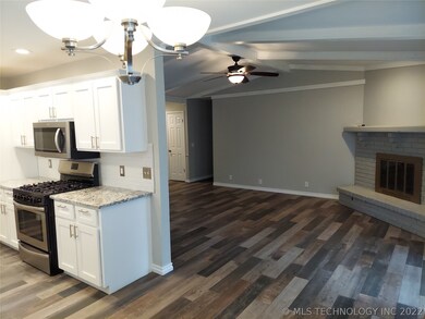 View from the breakfast nook into the family room.