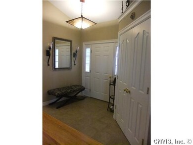 Foyer. Large foyer with cathedral ceilings and a c