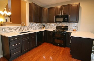 Efficient work area with granite counter tops and 