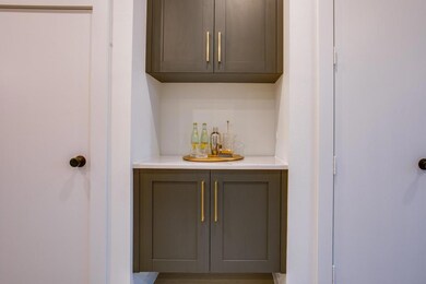 Bar with gray cabinetry