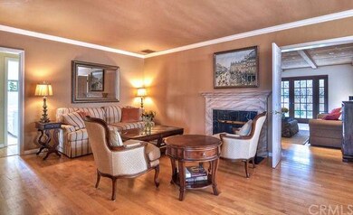Living room opening up to family room