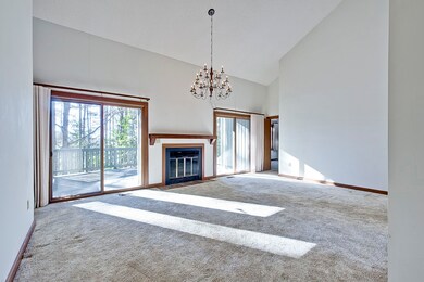 Sliding glass doors open on to large deck