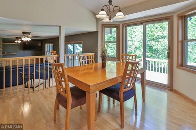 The informal dining room is bayed and walks out to
