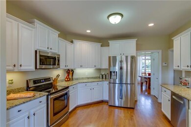 One of the many upgrades in this kitchen is the range with induction cooktop!