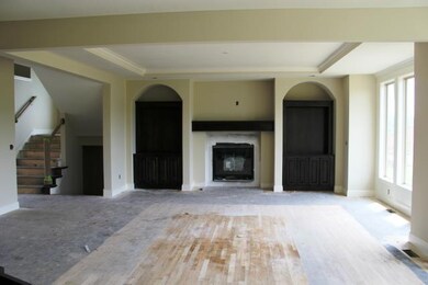 Great Room with fireplace and bookcases