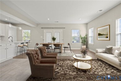 Living area featuring recessed lighting and light wood-style floors