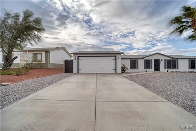 Ranch-style home featuring a garage