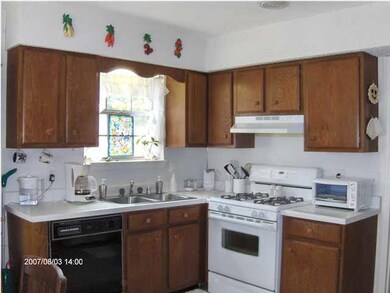 Updated bright and airy kitchen with new gas stove