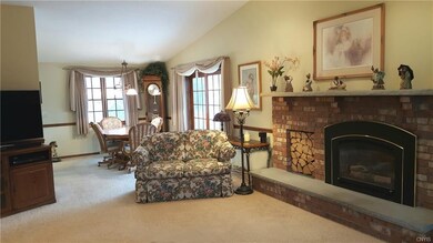 The gas fireplace creates a family atmosphere of g
