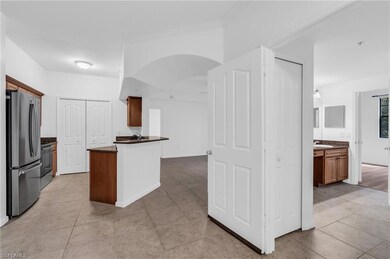 Kitchen featuring light tile patterned flooring, s