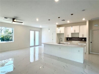Kitchen featuring pendant lighting, a spacious isl