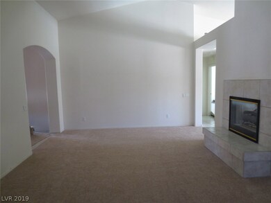 Living Room with Front Door and Foyer on Left and