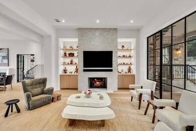 Living room featuring wood finished floors, a til