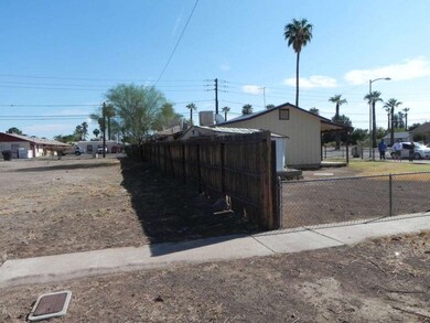 Back Fence behind units