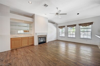 Make a Drink at the Wet Bar and get Cozy by the Ga