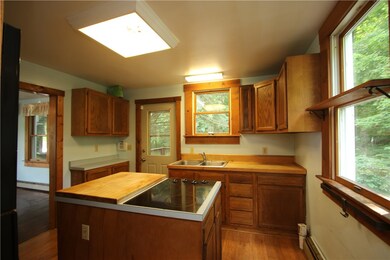 Another View of Kitchen w/ Back Door leading to HU