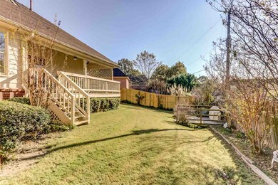 Relax outside in the delightful fenced backyard wi